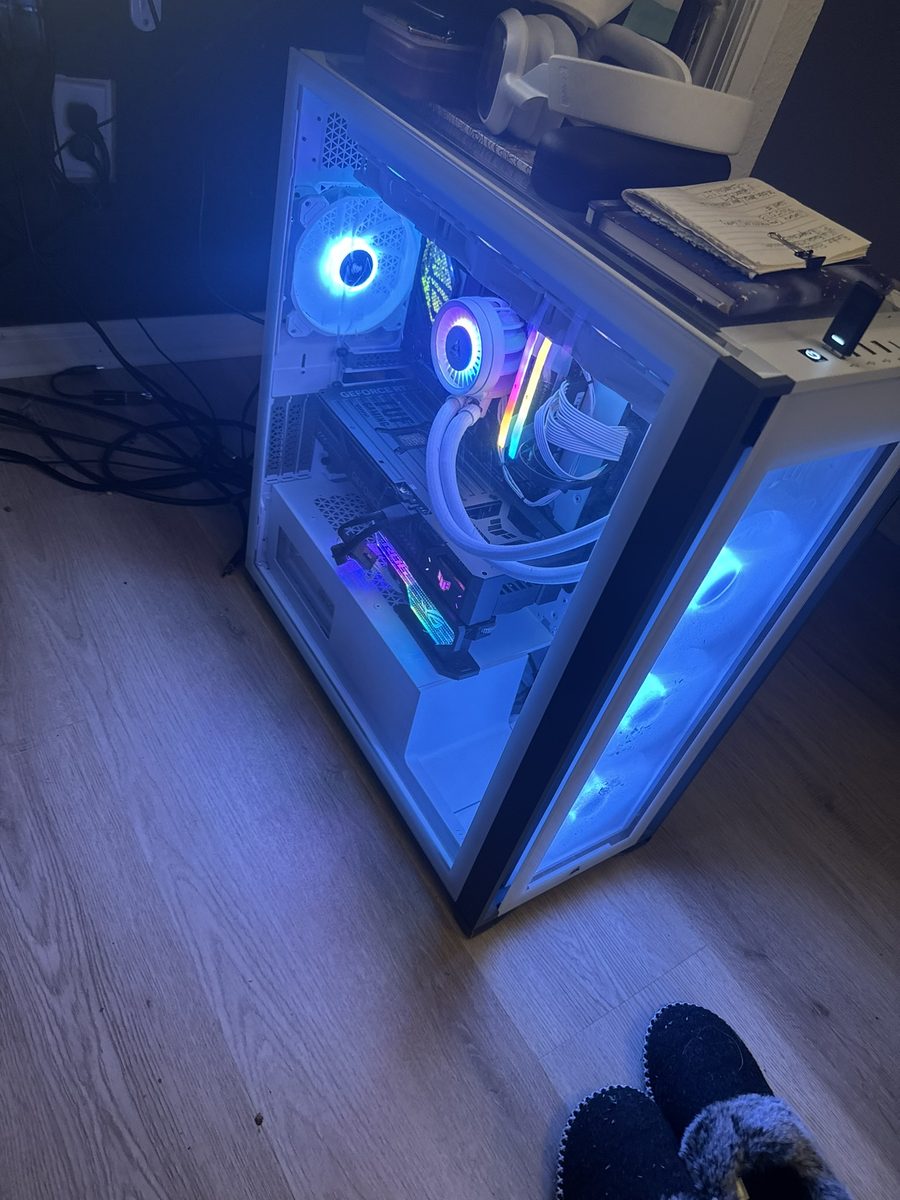 PC build with components laid out on a desk before assembly