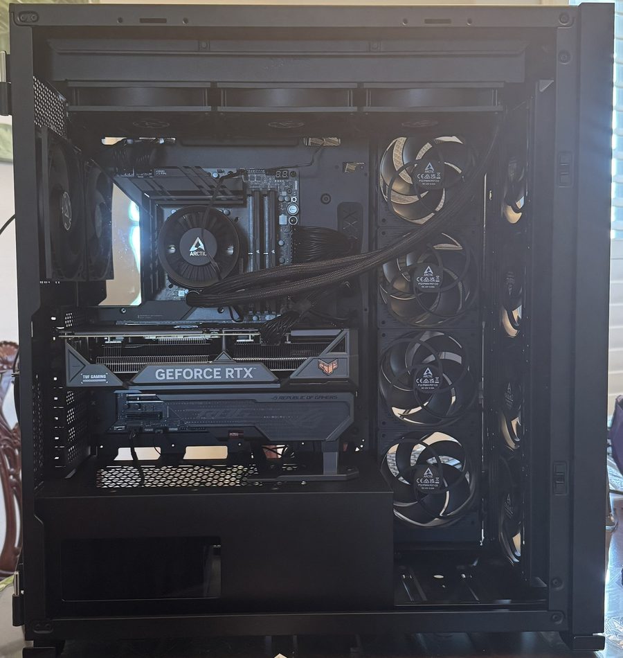 Custom desktop PC build with the case open showing installed components